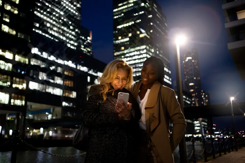 businesswomen meeting outdoors night city Citygirlsnyc